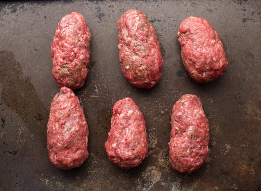 Smoked Beef Armadillo Eggs With Red Wine Glaze Vindulge