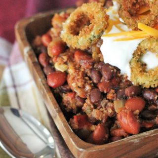 This Smoked Chili gets a hit of smoky flavor from grill-roasted meat and veggies and the fried jalapeno rings hit you with enough spice to make you sweat.