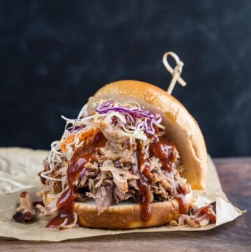 A pulled pork sandwich made with easy smoked pulled pork