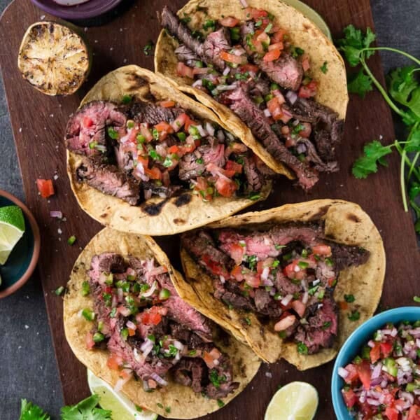 Carne Asada Tacos on a platter.