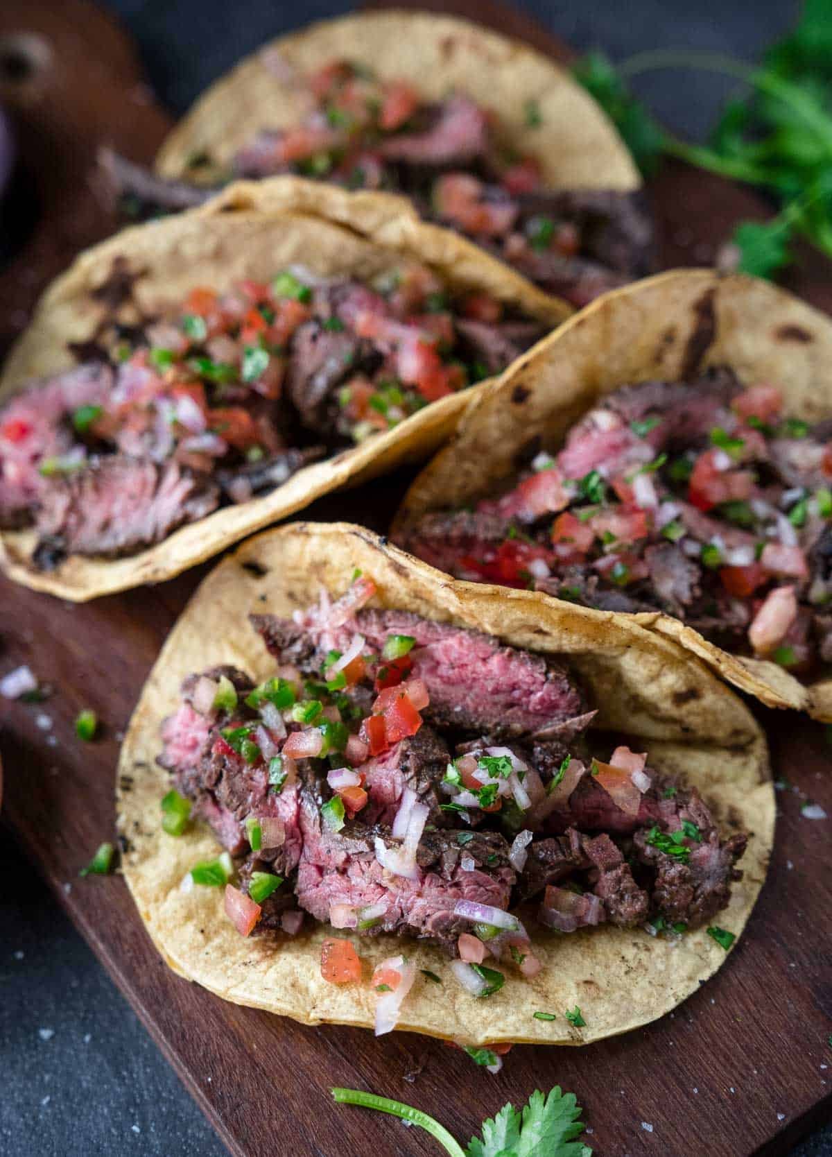 Carne Asada Skirt Steak Tacos on a platter.