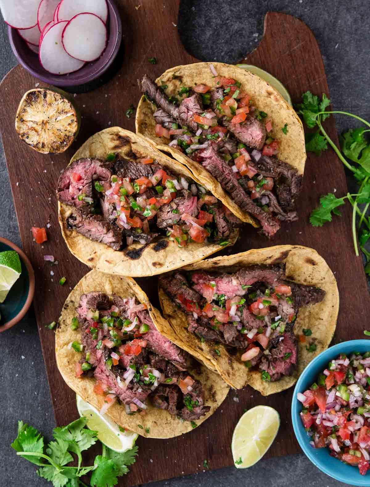 Carne Asada Skirt Steak Tacos on a platter.