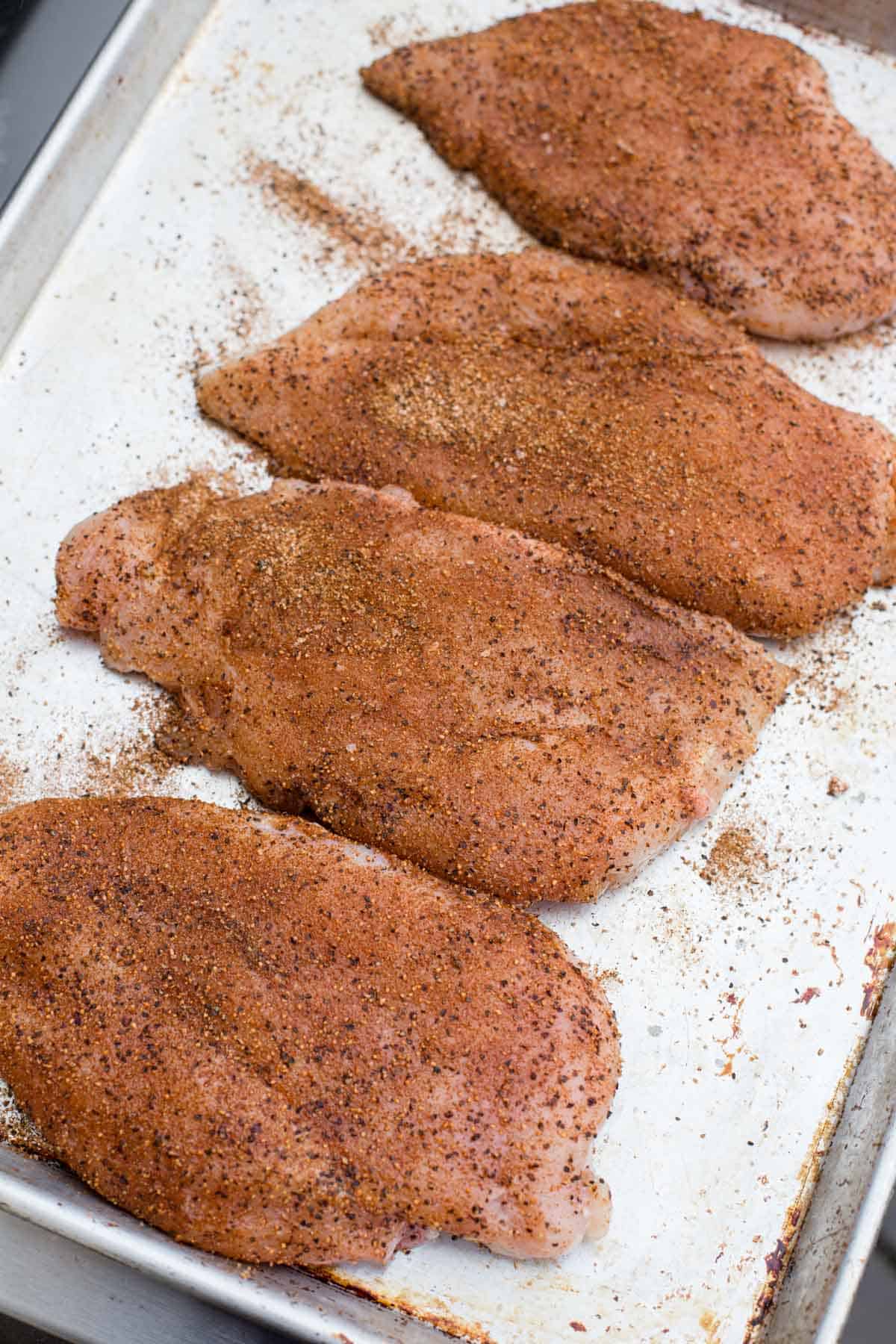 Seasoned boneless chicken breasts.