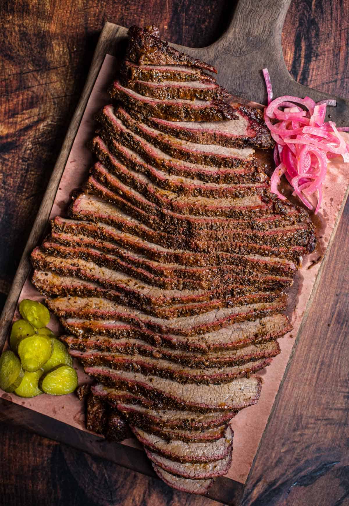 Smoked Brisket Flat slices on a cutting board