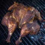 spatchcocked chicken on the grill