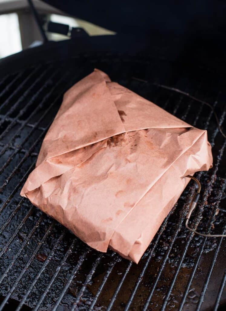 wrapped brisket flat on the smoker