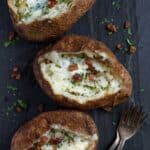 top view of 3 smoked baked potatoes