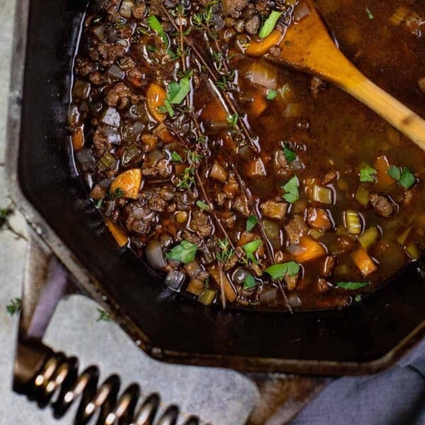 Smoked sausage and lentil soup in a Finex Dutch oven.