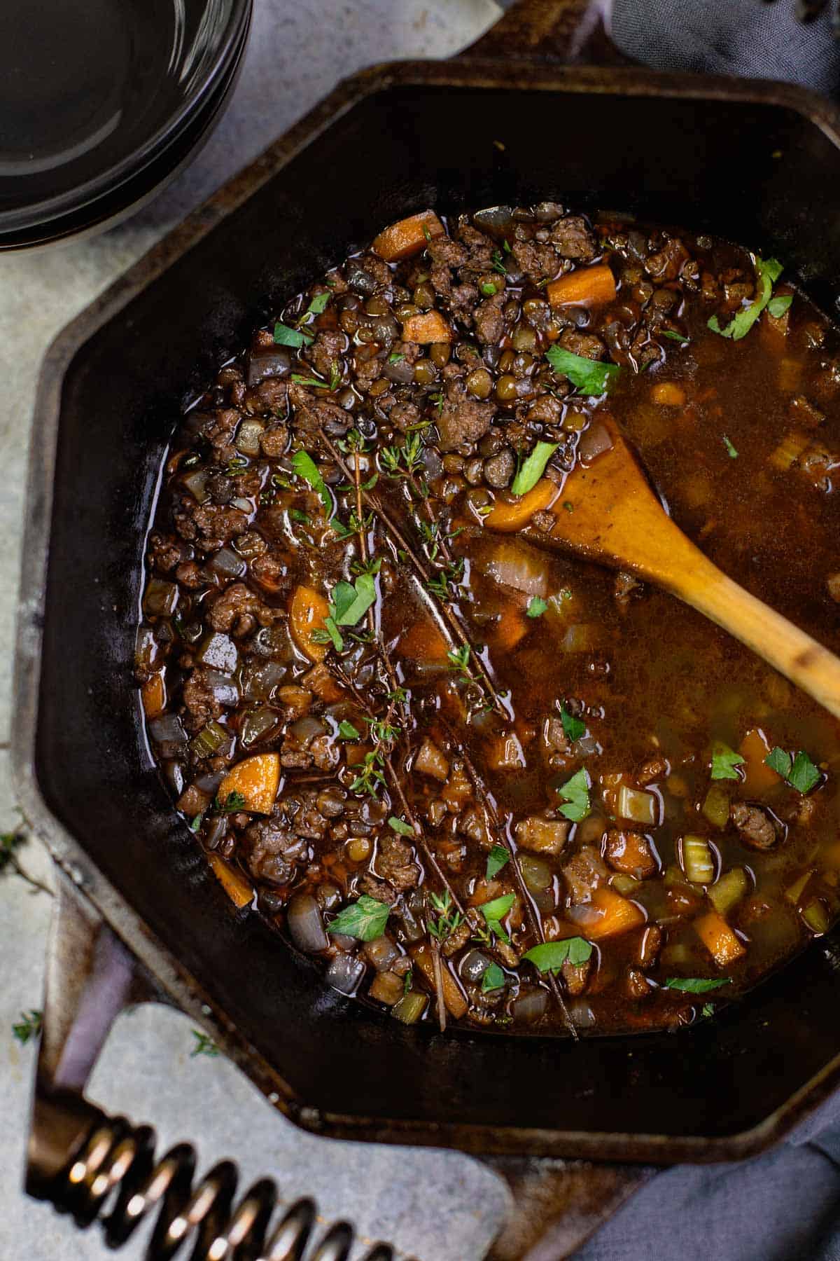 A pot of smoked sausage and lentil soup