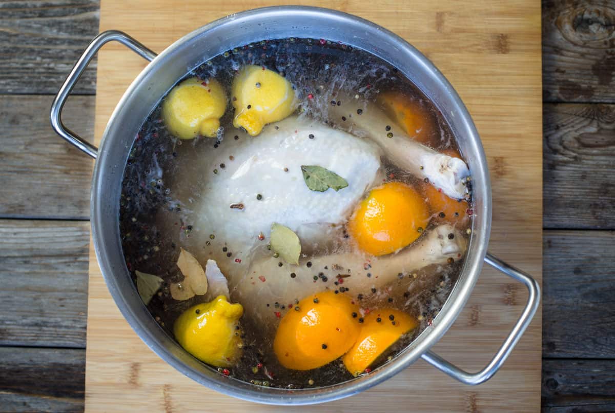 Turkey brining in a pot of Turkey Brine