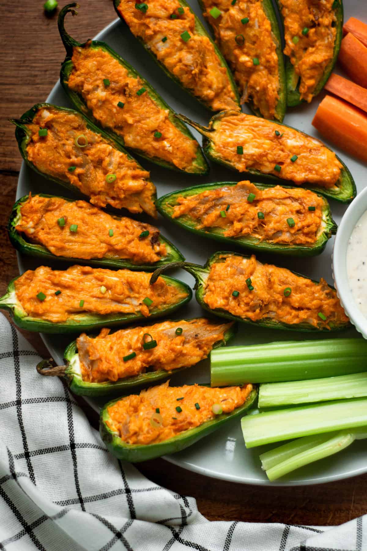 a plate of buffalo chicken Jalapeño poppers