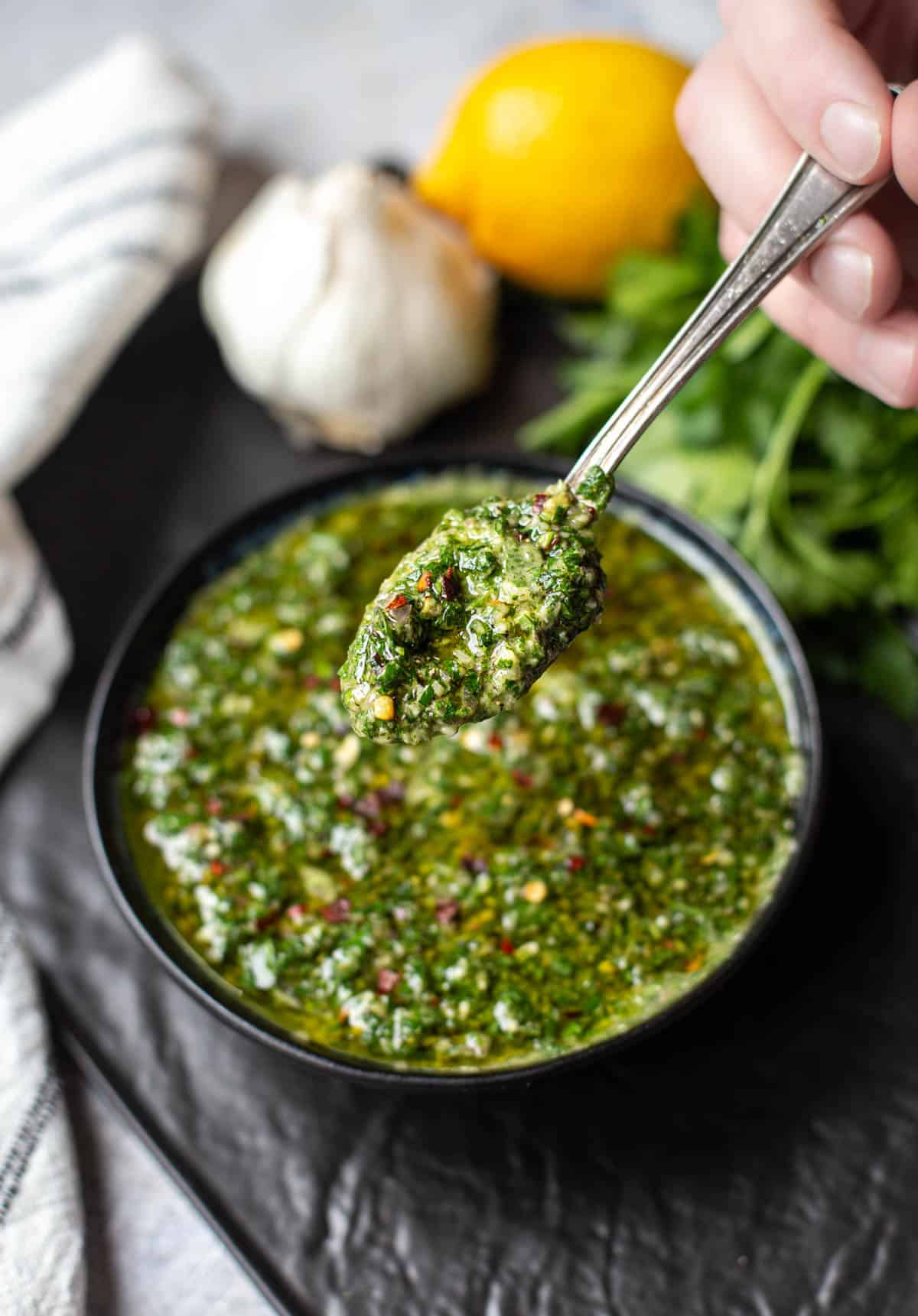 A spoonful of easy homemade Chimichurri Sauce 