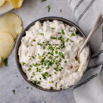 Smoked onion dip with sour cream and chives.