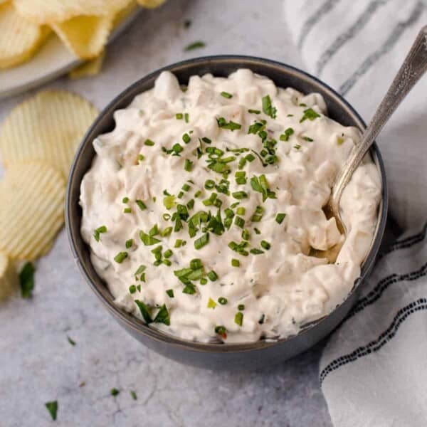 Smoked French Onion Dip in a bowl with chips.