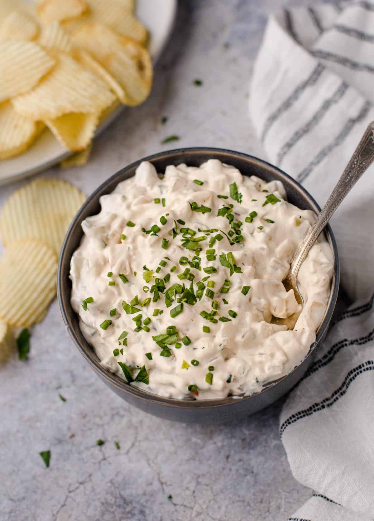 Smoked onion dip with sour cream and chives.
