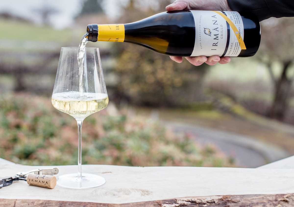 Corvo Irmana Grillo being poured into a wine glass