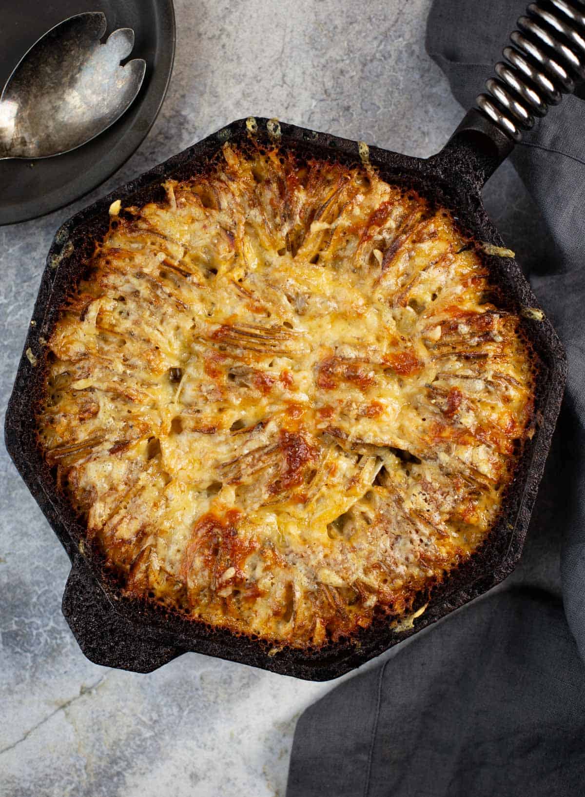 https://www.vindulge.com/wp-content/uploads/2022/03/Grilled-Hassleback-Potato-Gratin.jpg