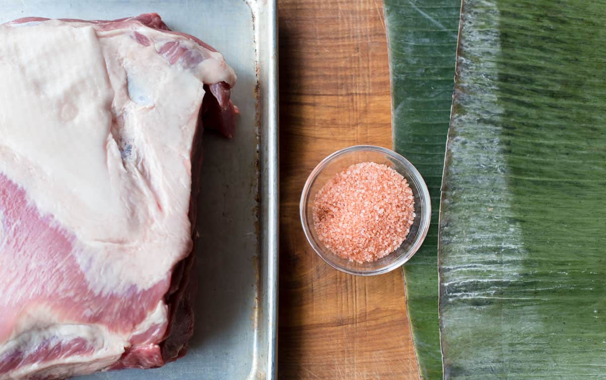 Ingredients for Kalua Pork on a cutting board