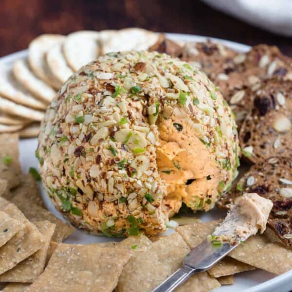 Smoked cheese ball with smoked cream cheese and crackers.