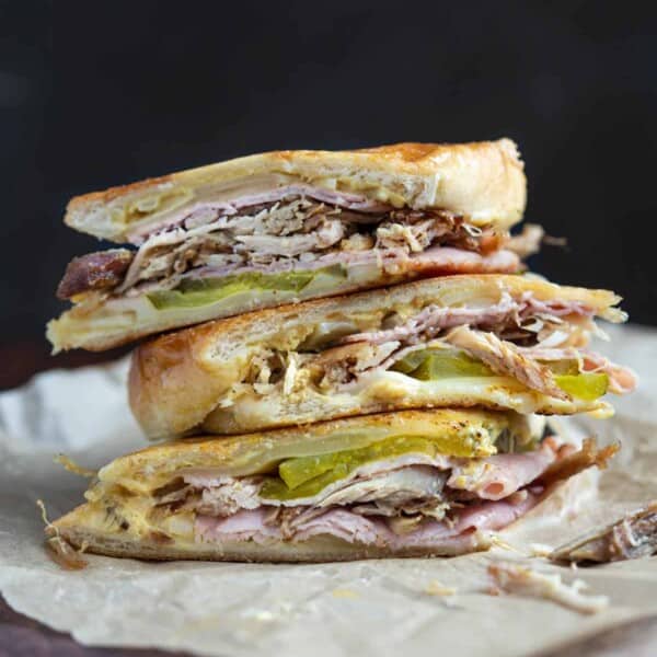 Smoked cuban sandwich recipe stacked on top of each other.