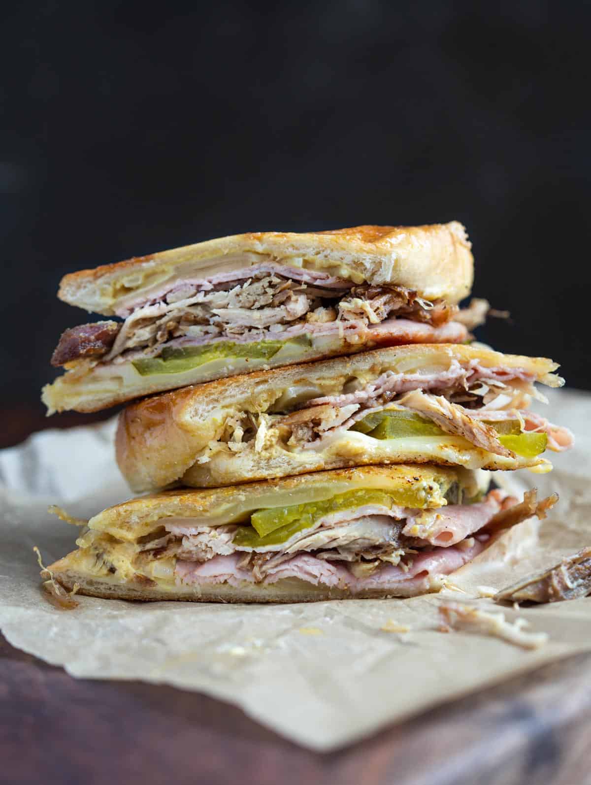 Smoked cuban sandwich recipe stacked on top of each other.