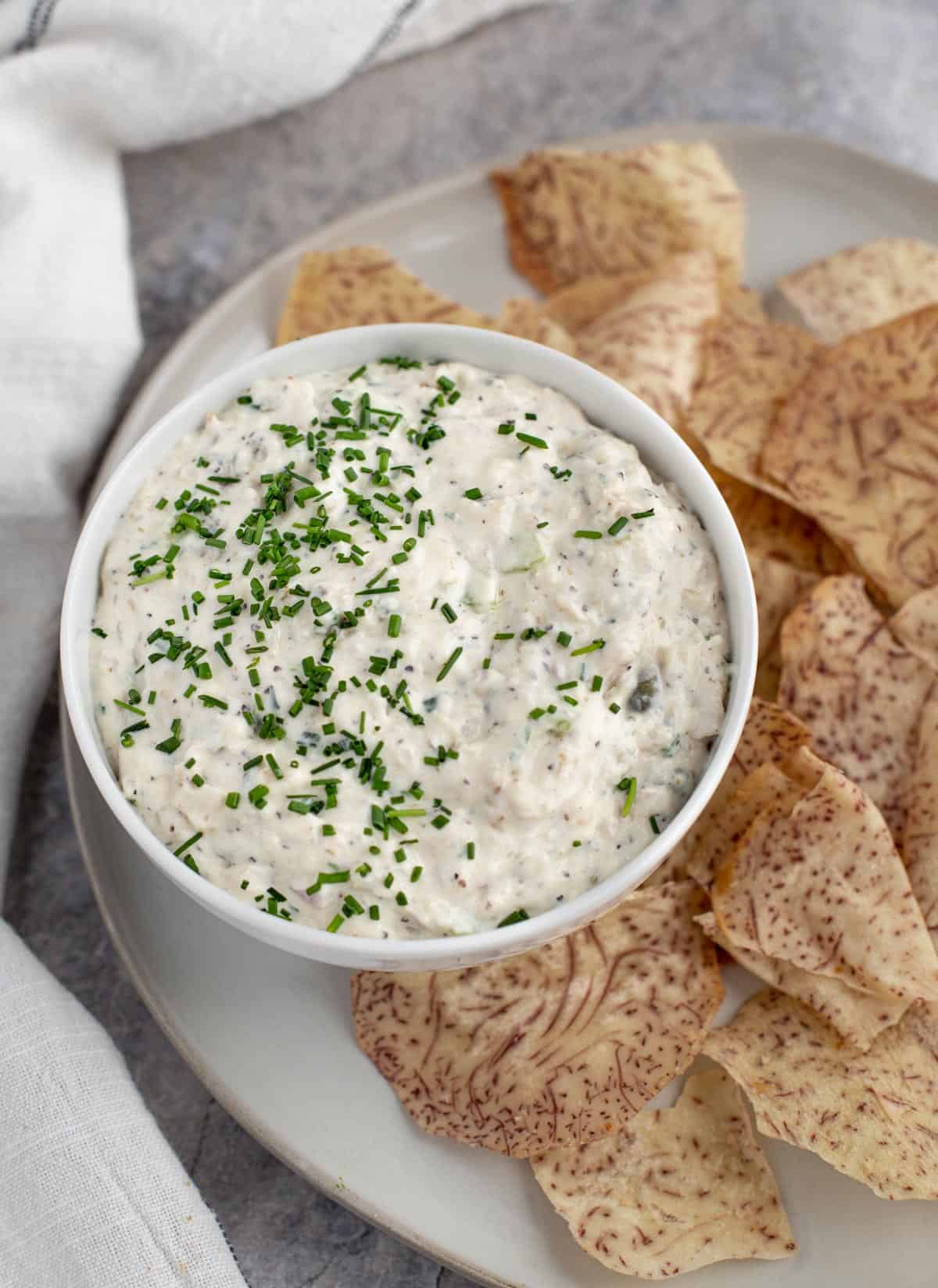 Smoked fish dip in a bowl with chips