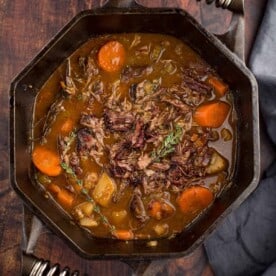 a cast iron pot of beef stew