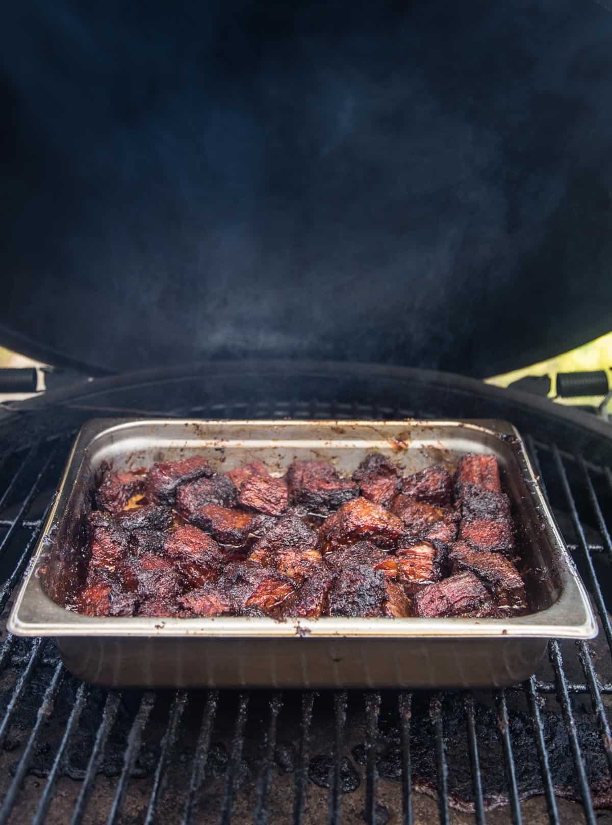A try of Brisket Burnt Ends cooking on a smoker