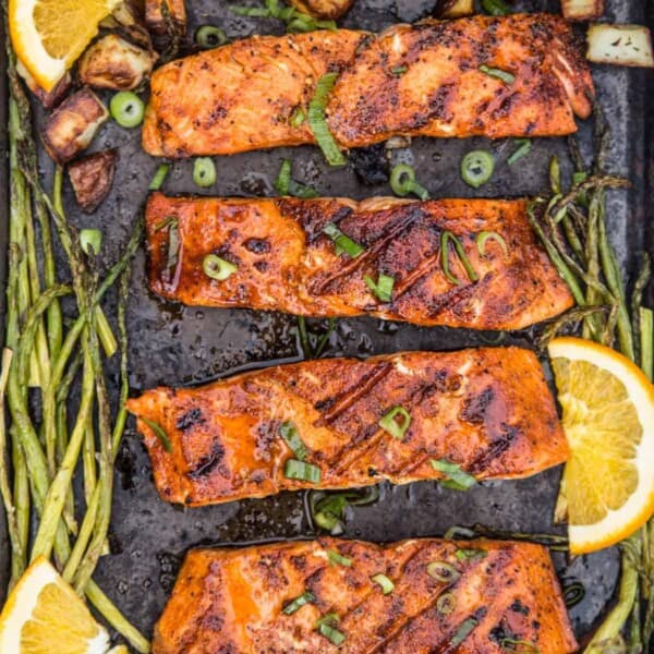 Grilled salmon with maple glaze on sheet pan.