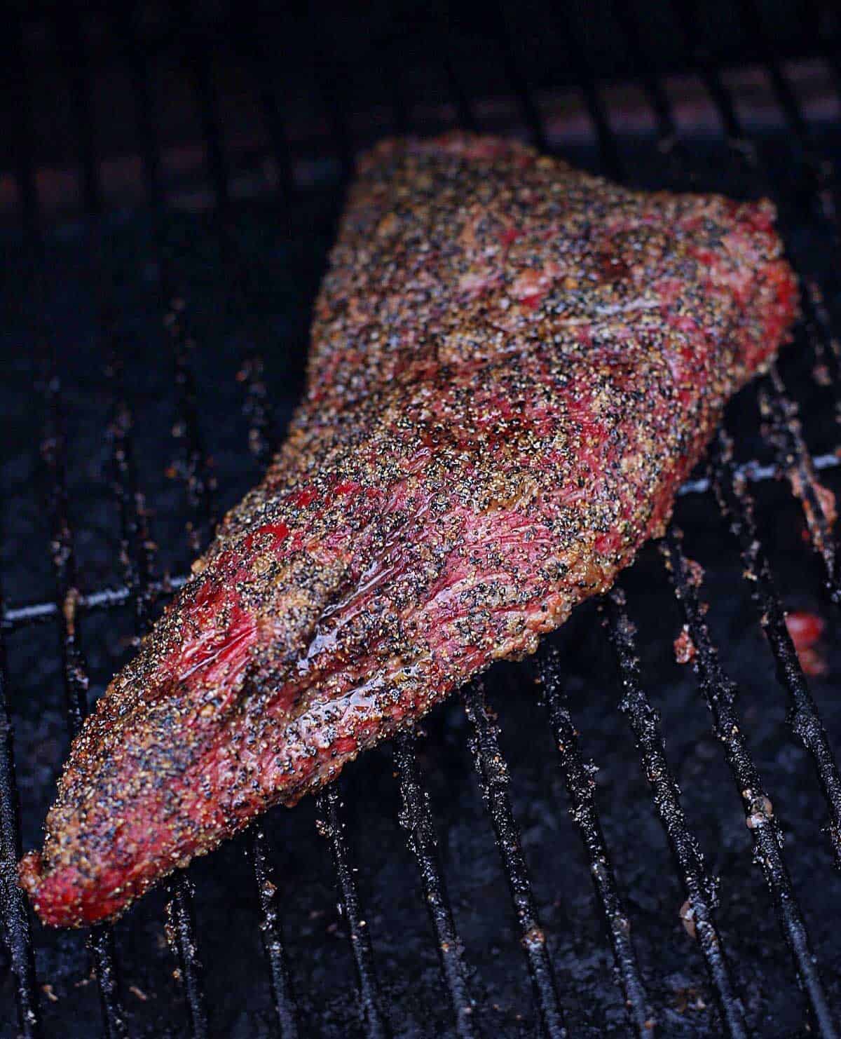 Smoked tri tip on a grill.