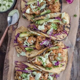 Grilled cauliflower tacos with avocado crema.