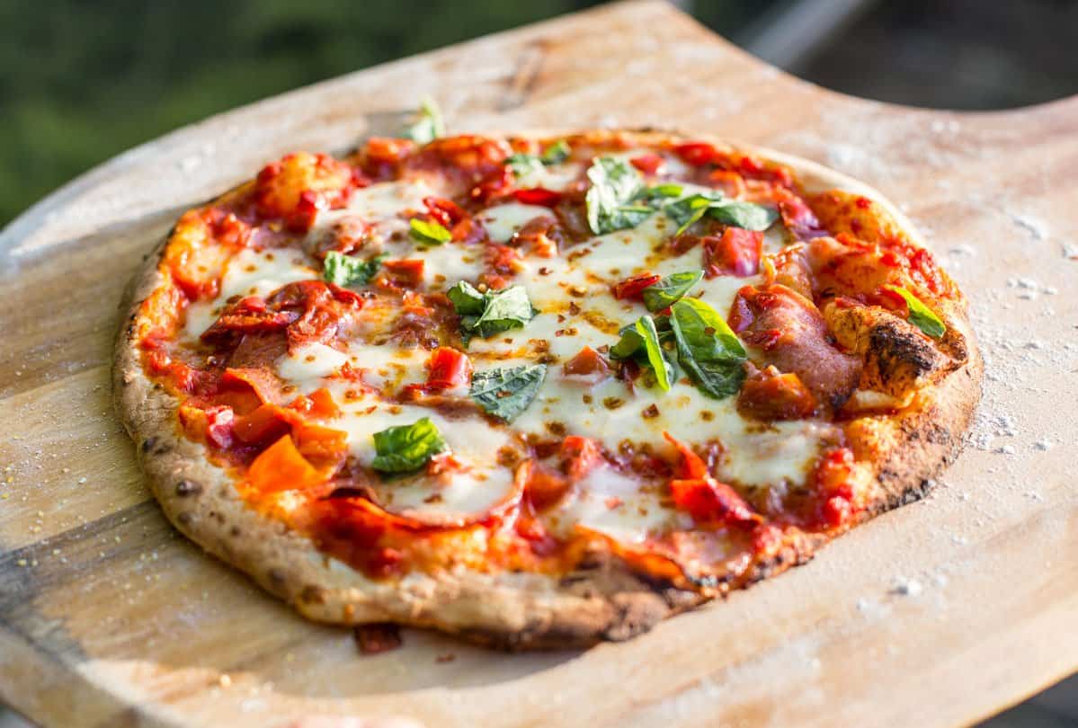 Grilled neapolitan margarita pizza made with a single pizza dough recipe.
