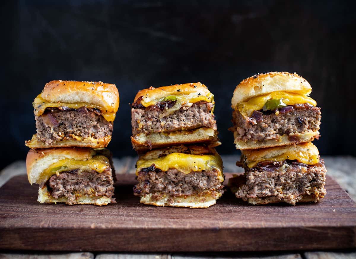 6 Cheeseburger sliders on a cutting board