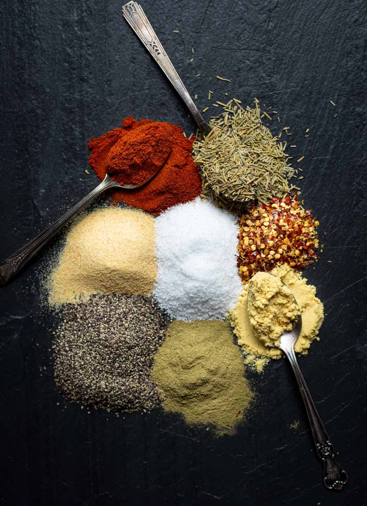 Ingredients for Beef Seasoning on a slate plate.