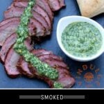 Sliced Tri-Tip steak with chimichurri sauce on a platter