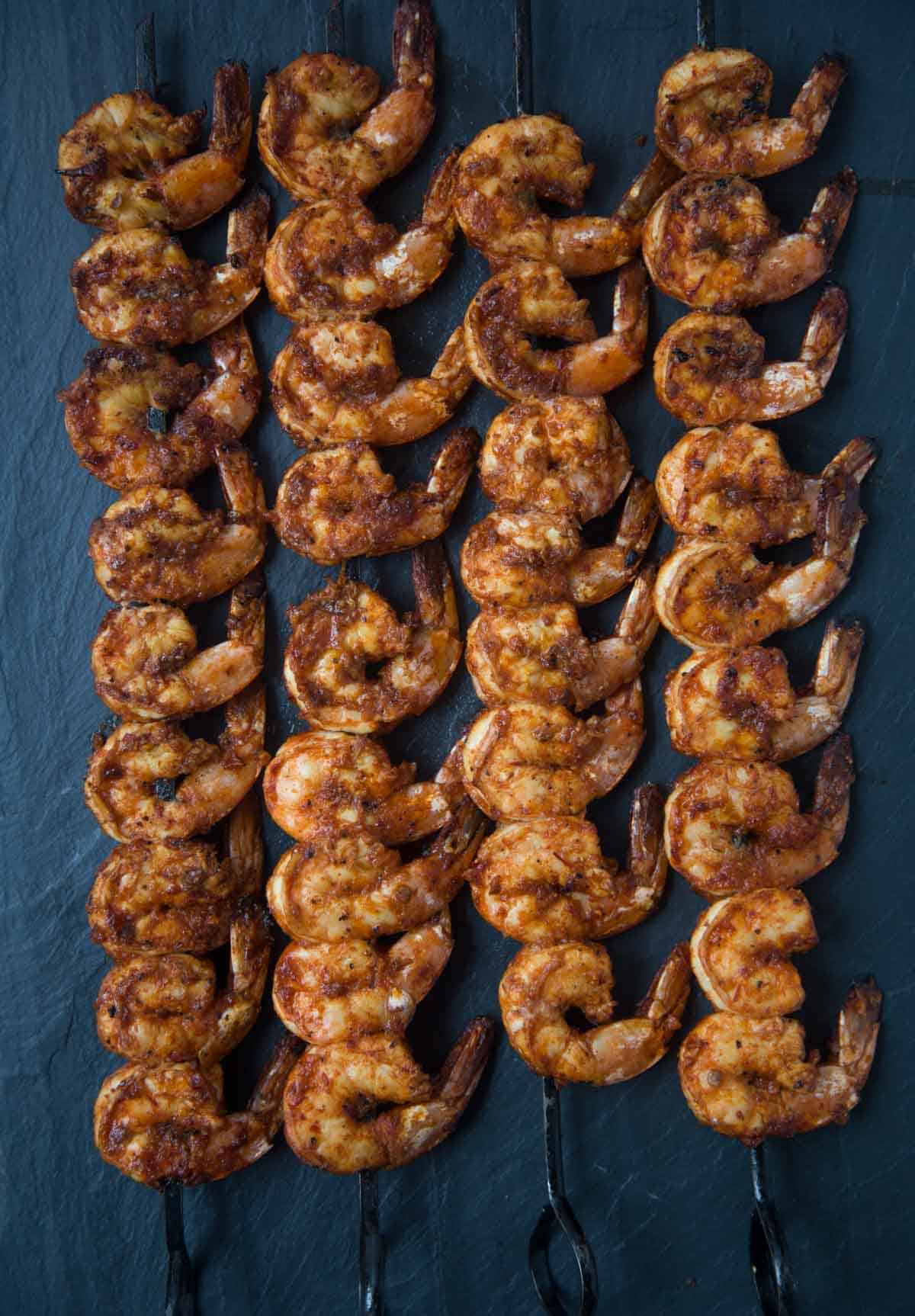 Chipotle Shrimp skewers on a platter.