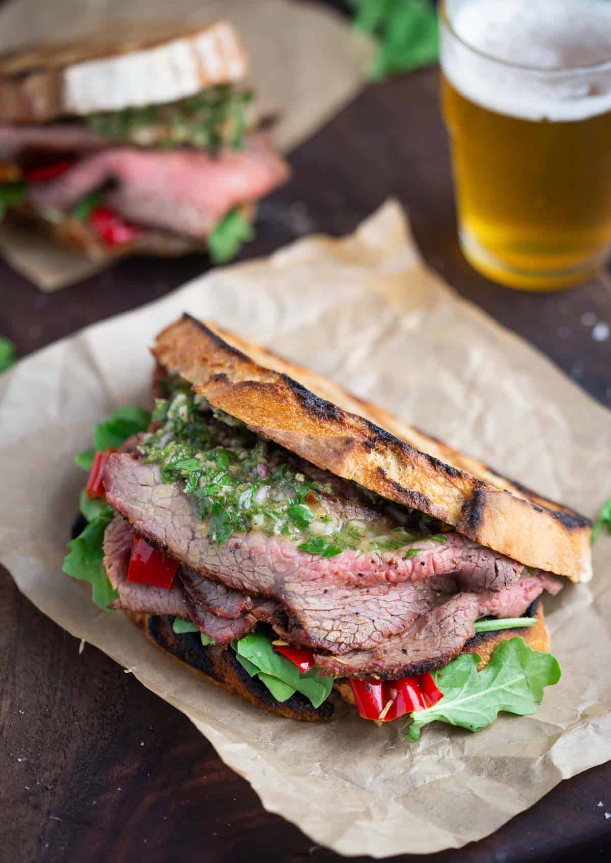 Tri Tip Steak Sandwich with a beer.