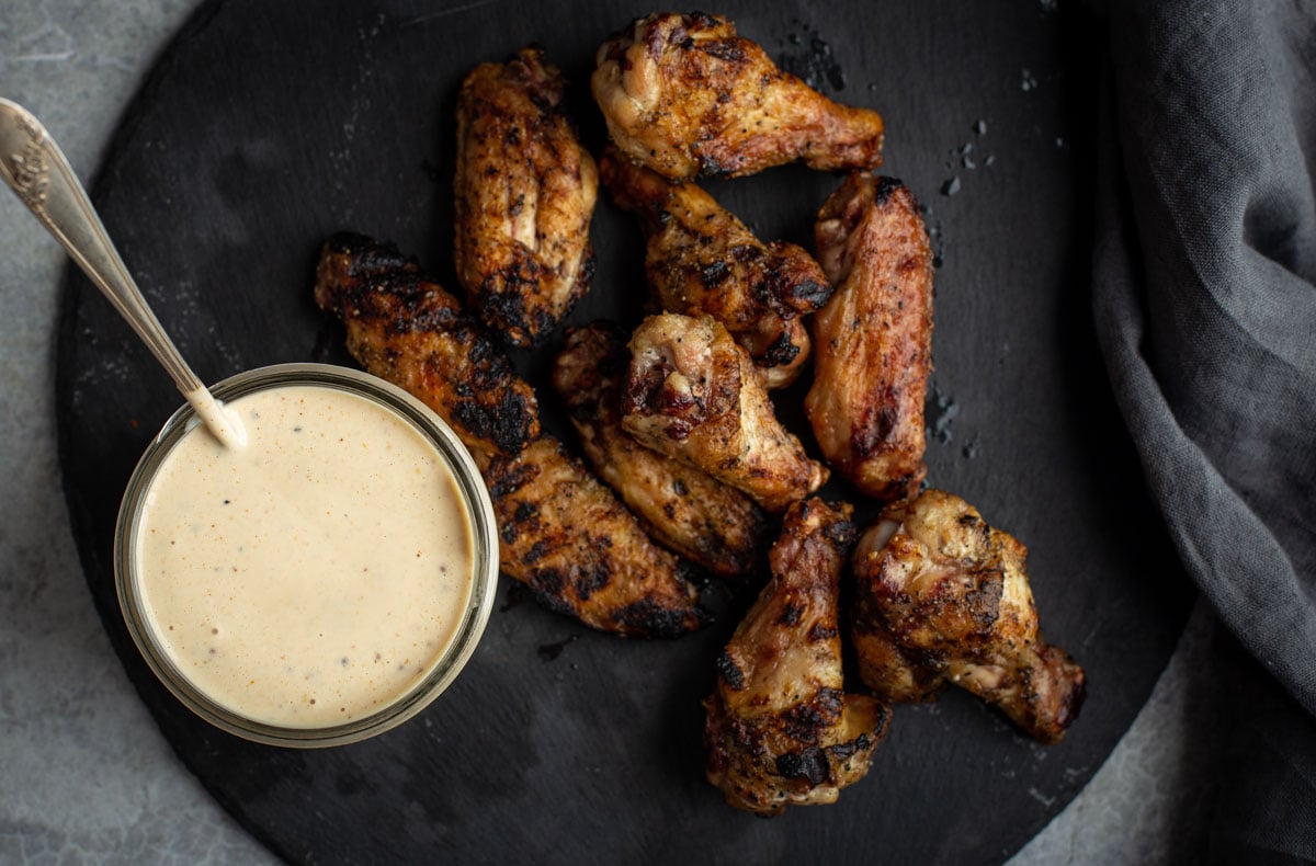 Alabama White Sauce dip for chicken. Alabama White Sauce and chicken together.
