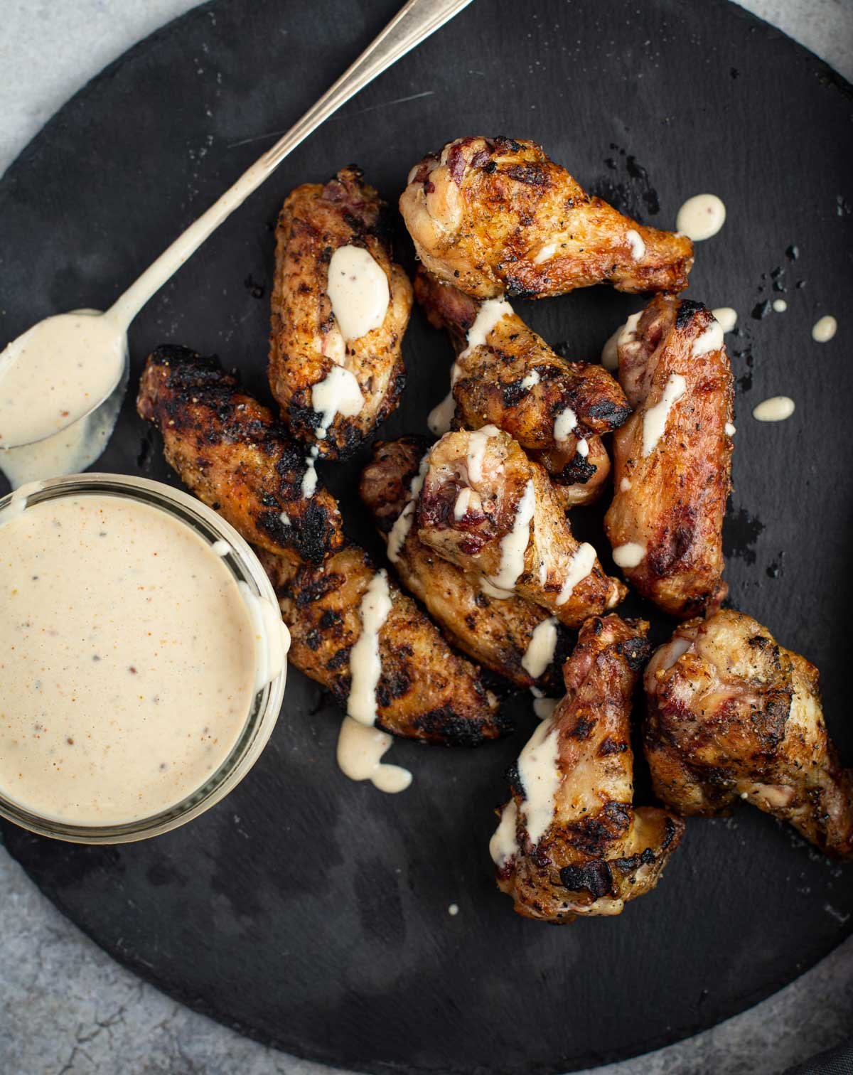 Chicken with Alabama White Sauce drizzed over the top. 