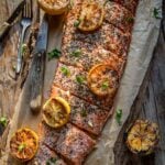 Smoked salmon on a cutting board.