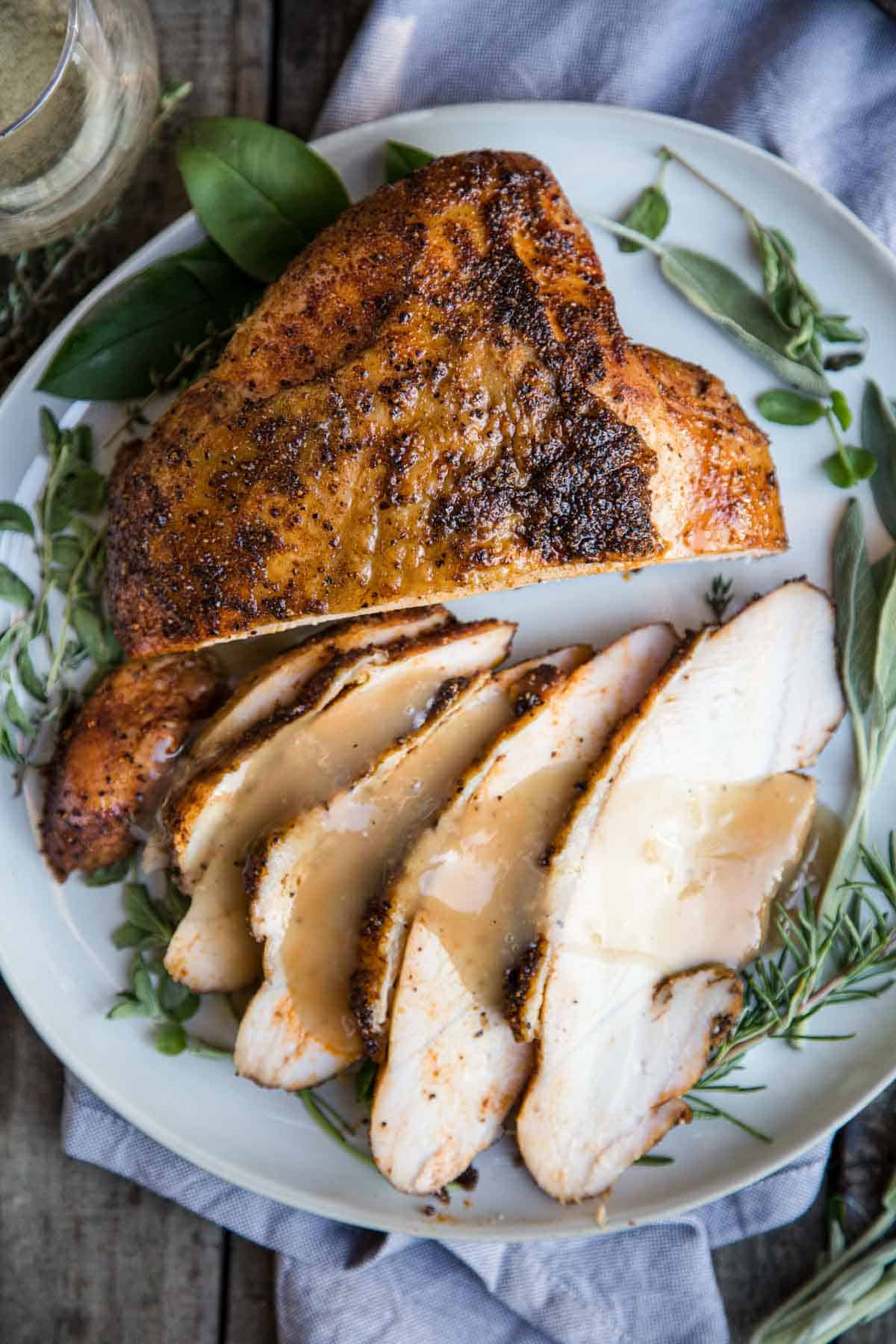 Smoked turkey breast with gravy over the top