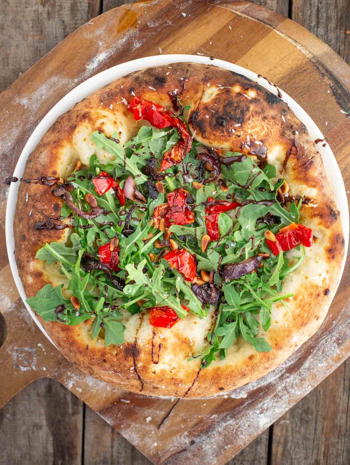 Garlic flat bread with arugula and balsamic