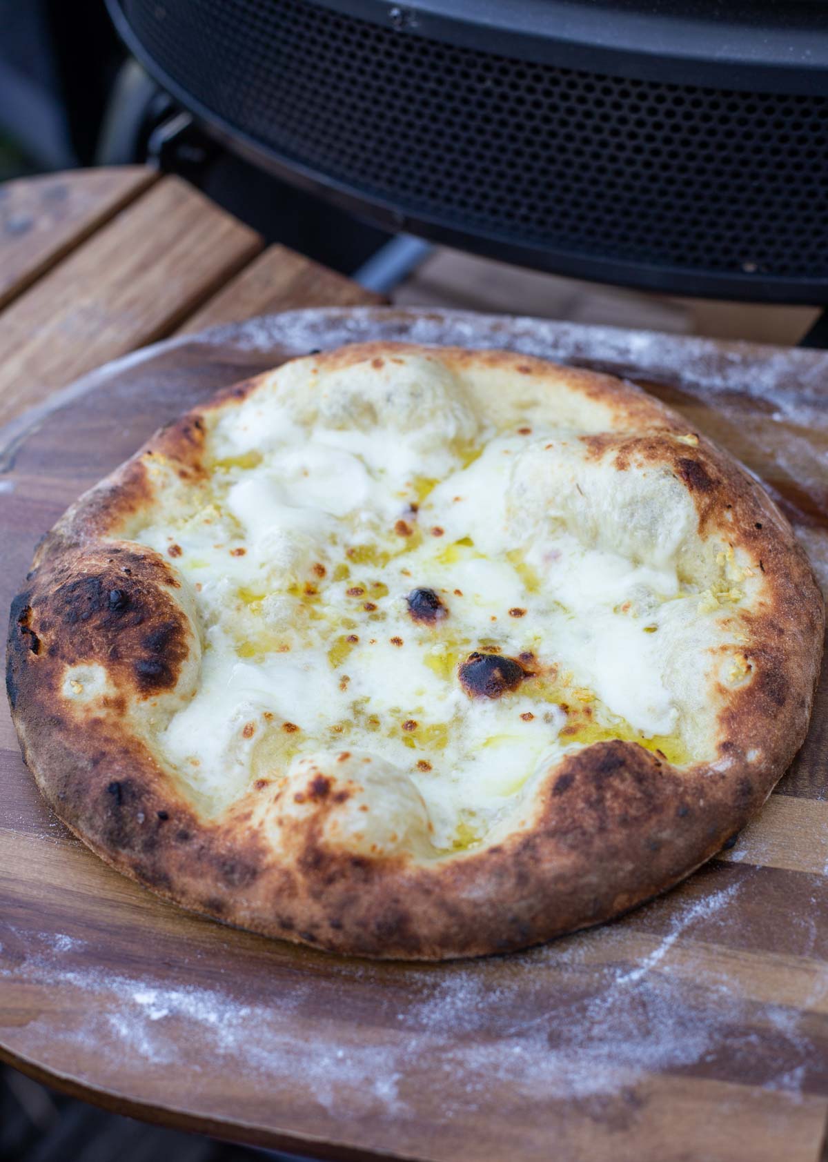 Cooked Garlic pizza before being topped.