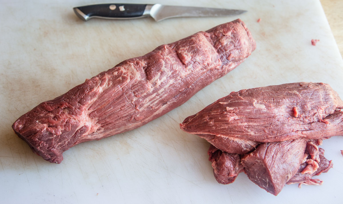 Trimmed beef tenderloin roast.