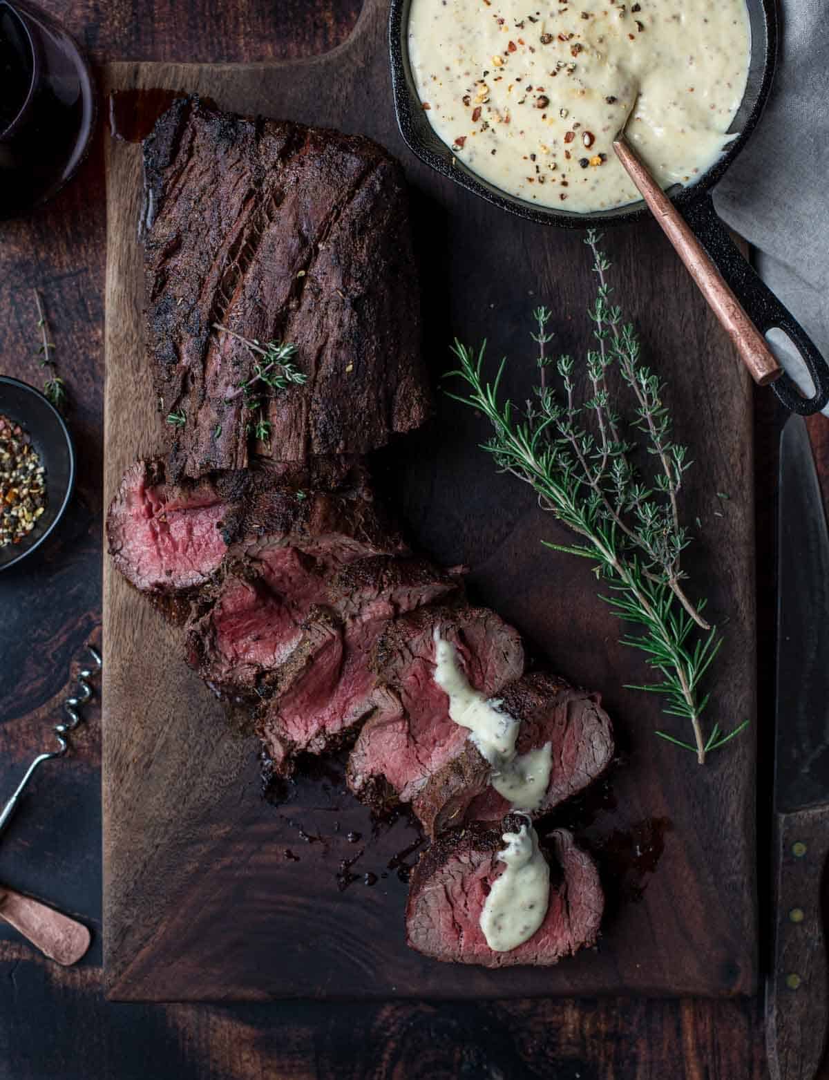 Grilled Beef Tenderloin slices topped with a mustard steak sauce