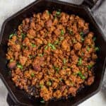 Homemade pork chorizo in a cast iron pan