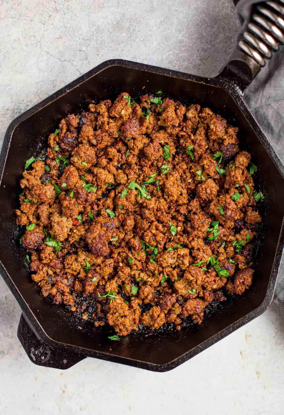 Homemade pork chorizo in a cast iron pan