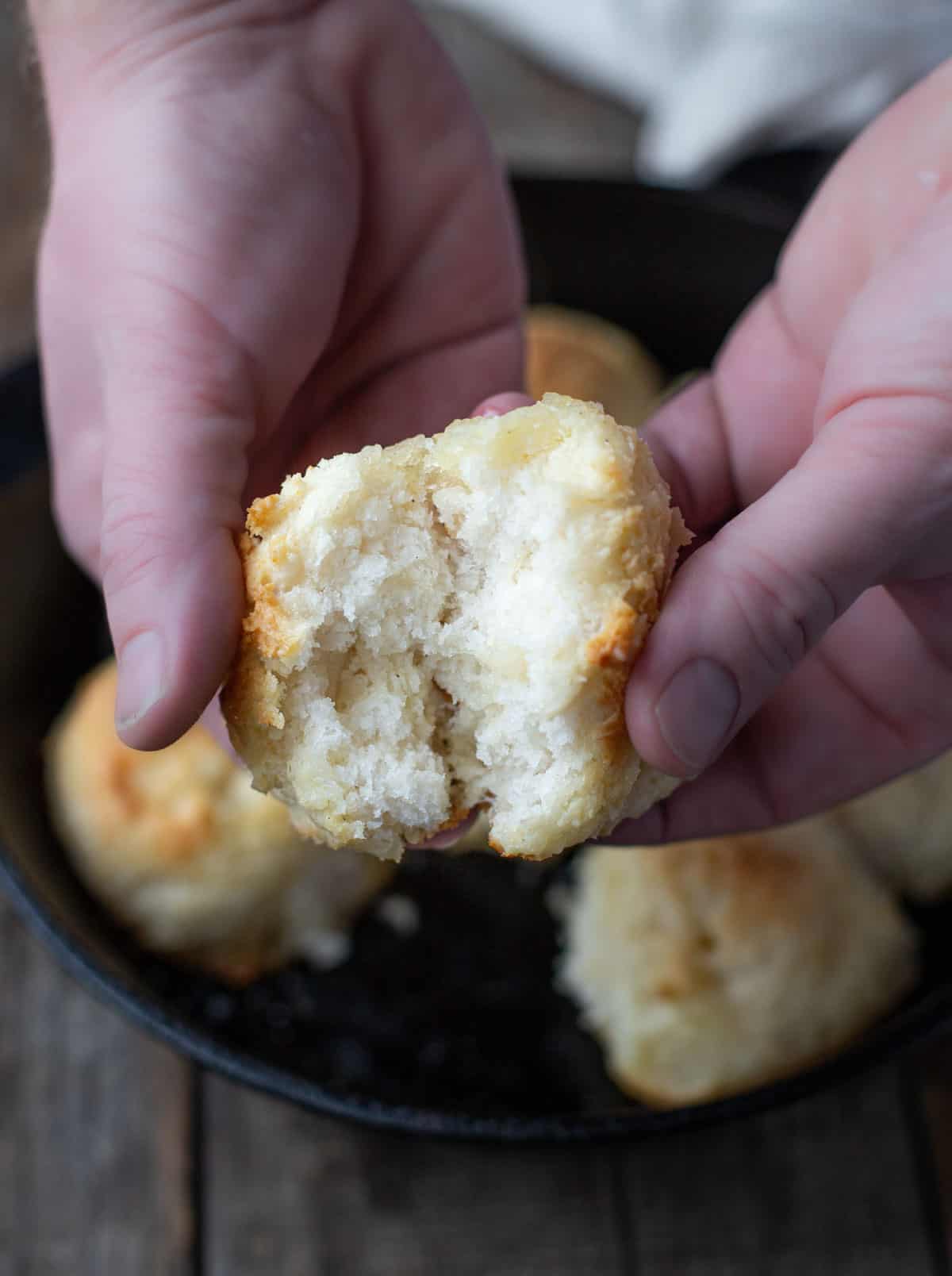 A gluten free drop biscuit cut in half 