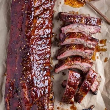 two racks of hot honey ribs on butcher paper