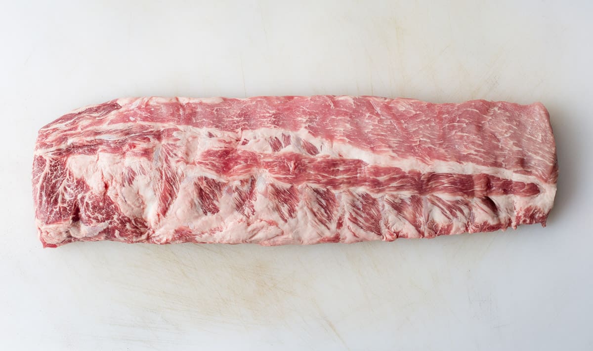 raw rack of ribs meat side